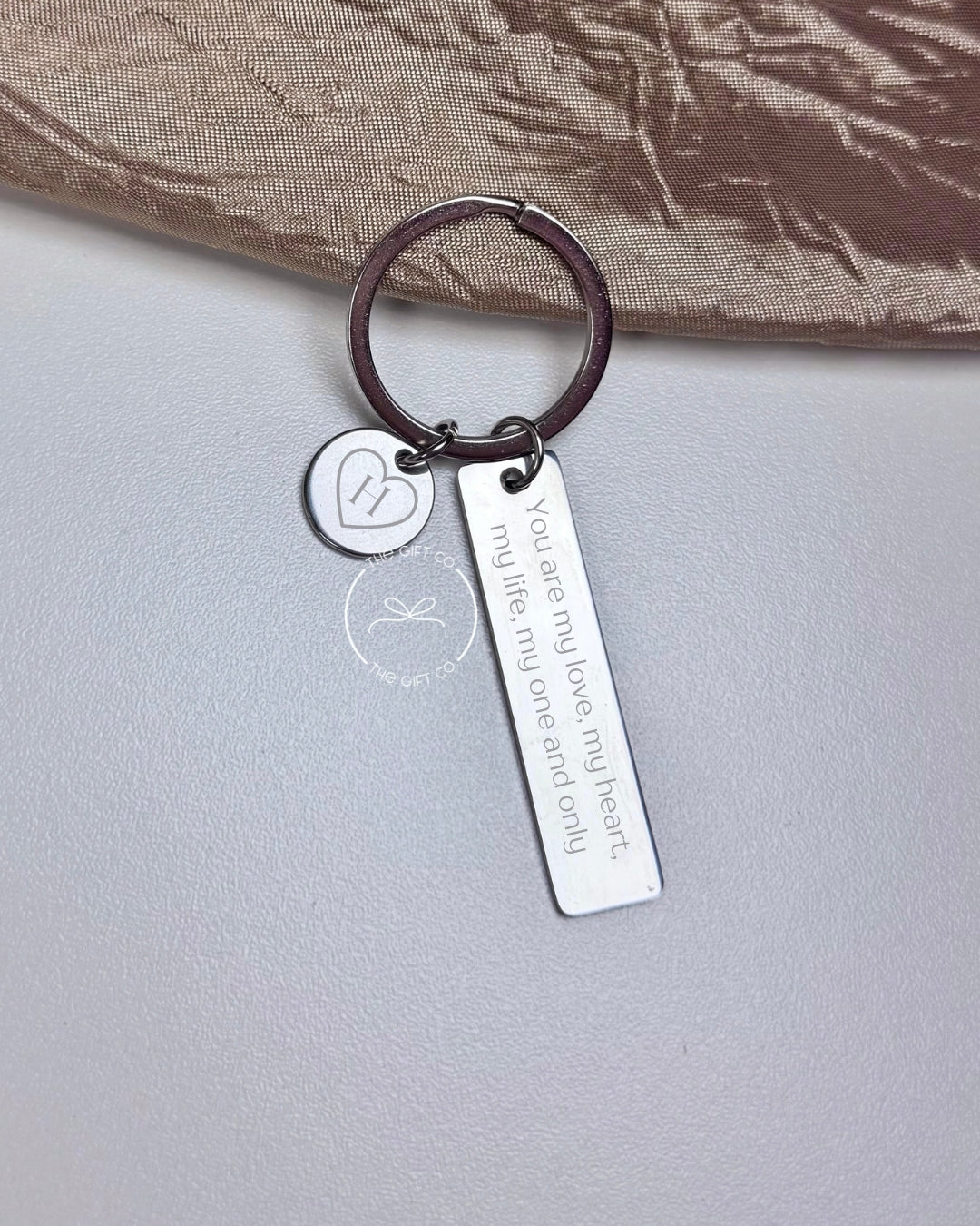 Llavero metal doble charm