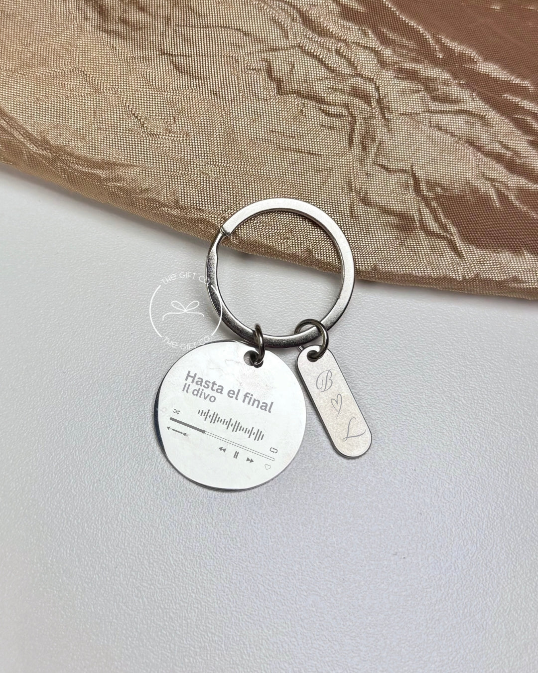 Llavero metal doble charm