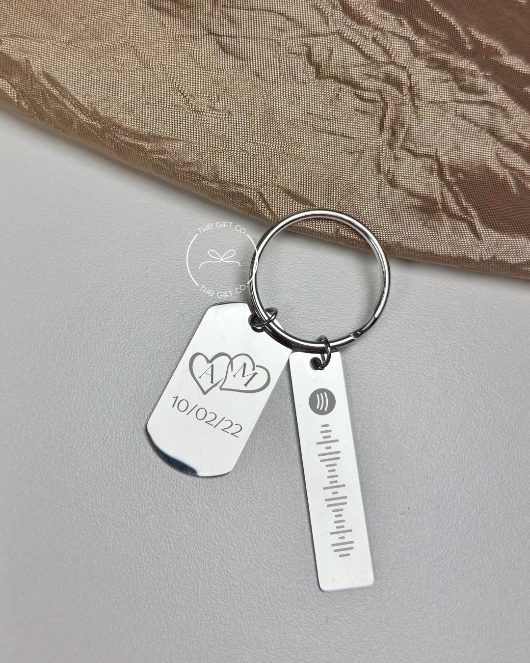 Llavero metal doble charm