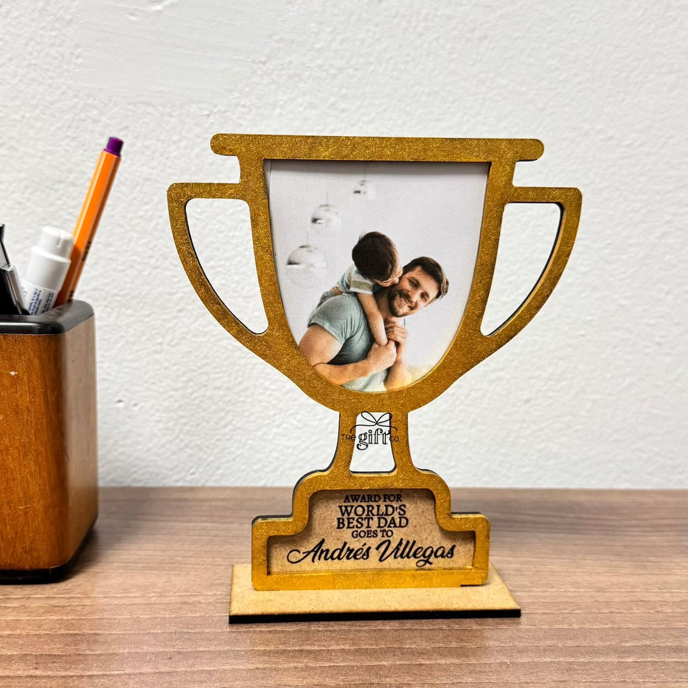 Retratera trofeo papá
